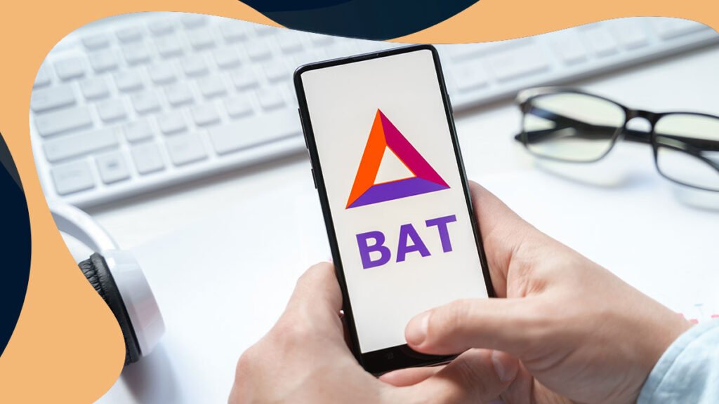 Holding a mobile device with the BAT logo